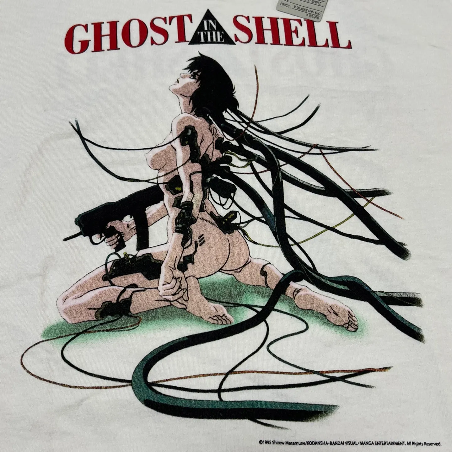 SAINT Mxxxxxx x GHOST IN THE SHELL ' GITS ' SS TEE/WHT Classic Big IP Ghost in the Shell co-branded Suzi Charge/Suzi Character TEE Off-white S-XL Cylindrical side seamless fabric 220g high gram weight OE yarn ⚠️Note: It is almost meaningless if it is not a cylindrical fabric Customized joint main mark/joint wash mark/little angel anti-counterfeiting label Original factory level printing factory Top purchasing agent level